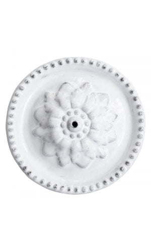 Astier de Villatte Emilie with beads ceramic flower incense holder handmade in Paris using black clay and dipped in white glaze, available at Amara Home.