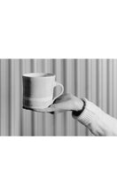 Load image into Gallery viewer, Hand holding black wash Straight Mug, handmade by Wonki Ware in South Africa, available at Amara Home.
